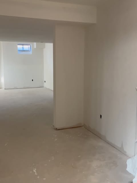 Basement rooms with new drywall